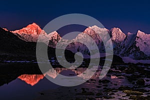 Mt Makalu sunset with lake mirror Himalaya