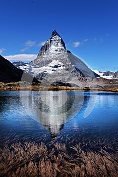 Mt Matterhorn reflected in Riffelsee Lake Zermatt Canton of Valais Switzerland