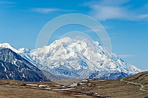 Mt McKinley - highest mountain in North America on a sunny day with blue sky