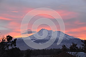 Mt Shasta with odd clouds at sunrise