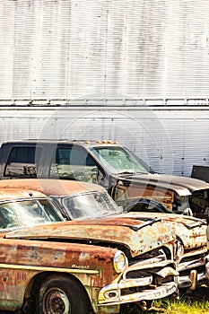 Old Hudson Hornet Sedan Car Parked and Rusting