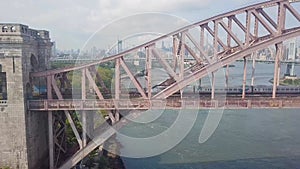 MTA train going over the Hell Gate Bridge in New York