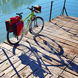 MTB Bicycle touring bike in a park with pannier