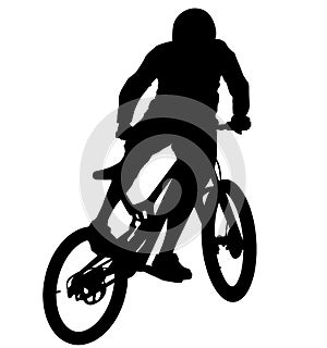 MTB downhill, enduro cross mountain biker doing an extreme jump on a mountain bike. MTB dh downhill mountain bike with helmet and