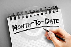 MTD - Month To Date acronym on notepad, business concept background photo