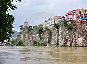 Mtkvari Kura river embankment and Metekhi church, Tbilisi, Georgia