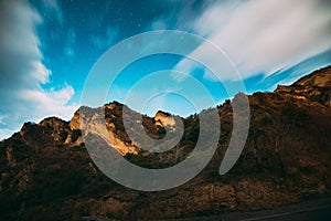 Mtskheta, Georgia. Autumn Night Starry Sky With Glowing Stars Above Limestone Canyon photo