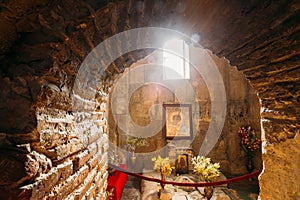 Mtskheta Georgia. View Through Arch To Icon Of Theotokos Under Window photo