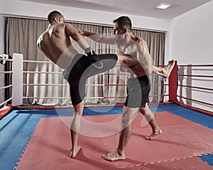 Muay thai fighters sparring