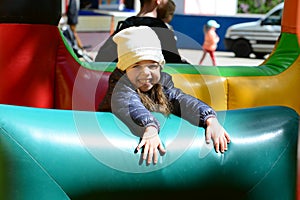 So much fun at a bouncy castle photo