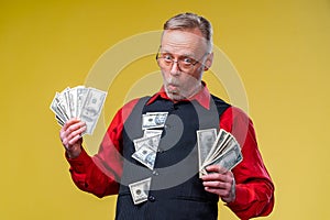 much money in hands. dollar in hands. Man holds dollars Piles of dollars bills