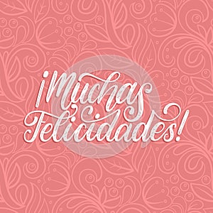 Muchas Felicidades translated from Spanish handwritten phrase Congratulations on pink background.Vector illustration. photo