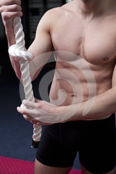 Mucle man with rope