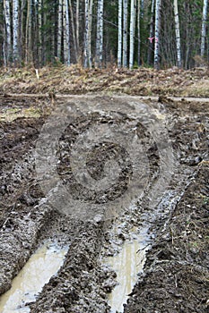 Mud driveway rutted up by 4x4`s