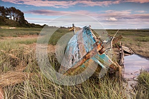 Mud flats and derelict boats at Heswall near Liverpool