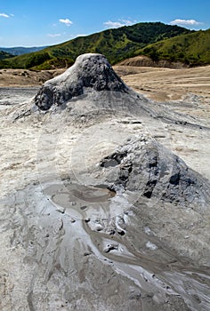 Mud geyser or mud volcano. Geological formation hydrogeological