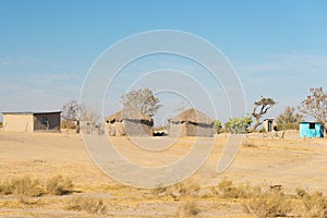 Mud straw and wooden hut with thatched roof in the bush. Local village in the rural Caprivi Strip, the most populated region in