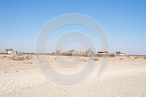 Mud straw and wooden hut with thatched roof in the bush. Local village in the rural Caprivi Strip, the most populated region in Na