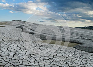 Mud volcano erupting with dirt, vulcanii Noroiosi in Buzau, Romania