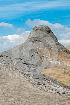 Mud volcanoes cone on blue sky looking like lunar landscape in vulcanii noroiosi reserve paclele mari buzau county romania