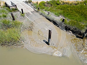 Muddy boat launch ramp, Hudeman Slough, aerial image