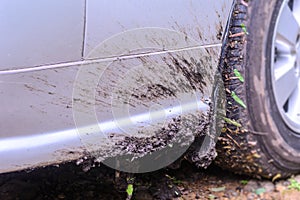 Muddy car in rainy day