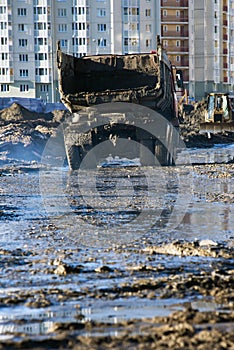 Muddy dump truck