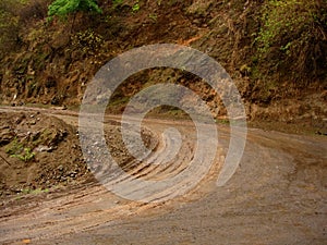 Muddy road bend