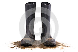 Muddy rubber boots front view photo