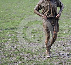 Muddy rugby player