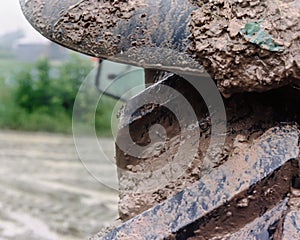 Muddy wet tractor tire