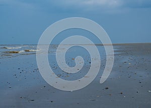 Mudflat along the Dutch coast at sunset