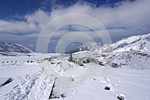 Mudoro field in November with snow mountain background