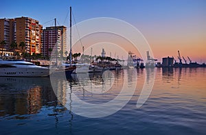 Muelle Uno Pier and Malaga Port on twilight, Spain photo