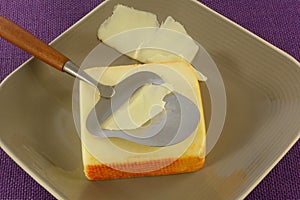 Muenster cheese and cheese slicer