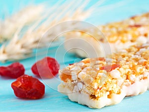 Muesli bar on blue background