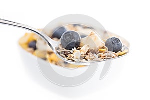 Muesli with Blueberries on a spoon