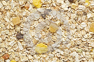 Muesli breakfast background. Organic crunchy homemade cereal with oats and berries. The concept of Healthy eating.