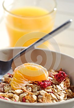 Muesli breakfast with orange juice