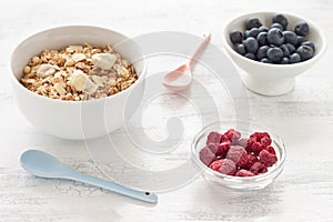 Muesli, granola and berries for breakfast