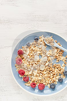 Muesli, granola and berries for breakfast