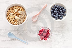 Muesli, granola and berries for breakfast