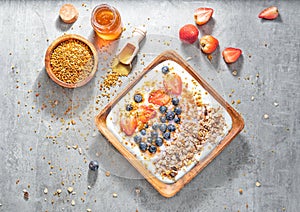 Muesli with yogurt and berries, healthy breakfast
