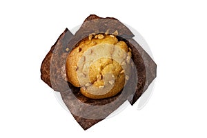 muffin in brown paper isolated on white background, top view