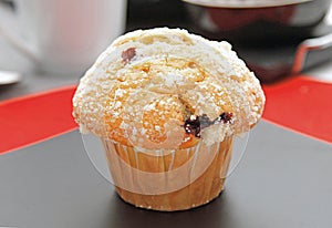 Muffin with chocolate on a plate