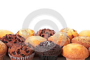 Muffin cup cakes border white background copy space