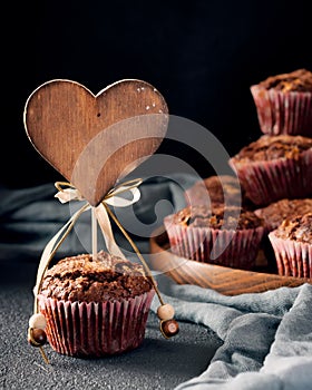 Muffin decorated with wooden heart tag