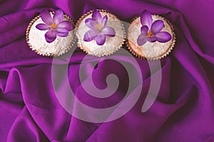 Muffins decorated with crocus flower photo