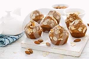 Muffins with flaked almond nuts. Cupcakes with nut chips