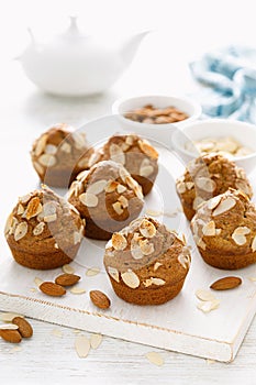 Muffins with flaked almond nuts. Cupcakes with nut chips